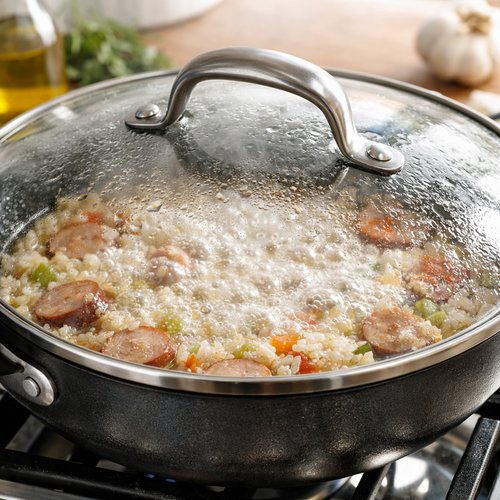 Step 5: Cover and Bring to a Boil, Then Reduce to Low Heat